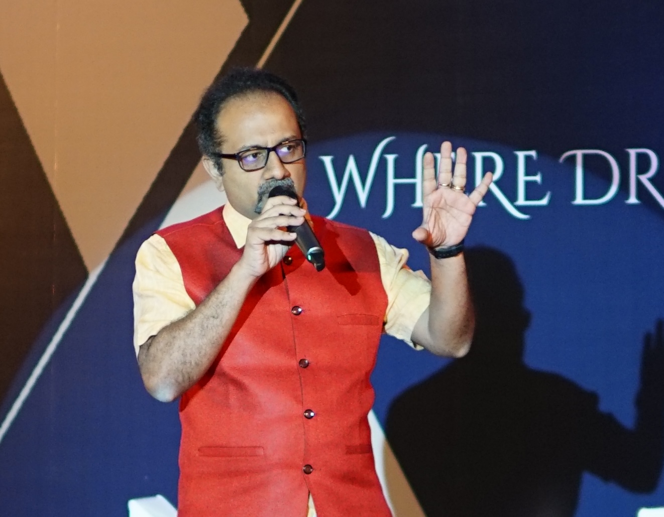 Sathya speaking at event