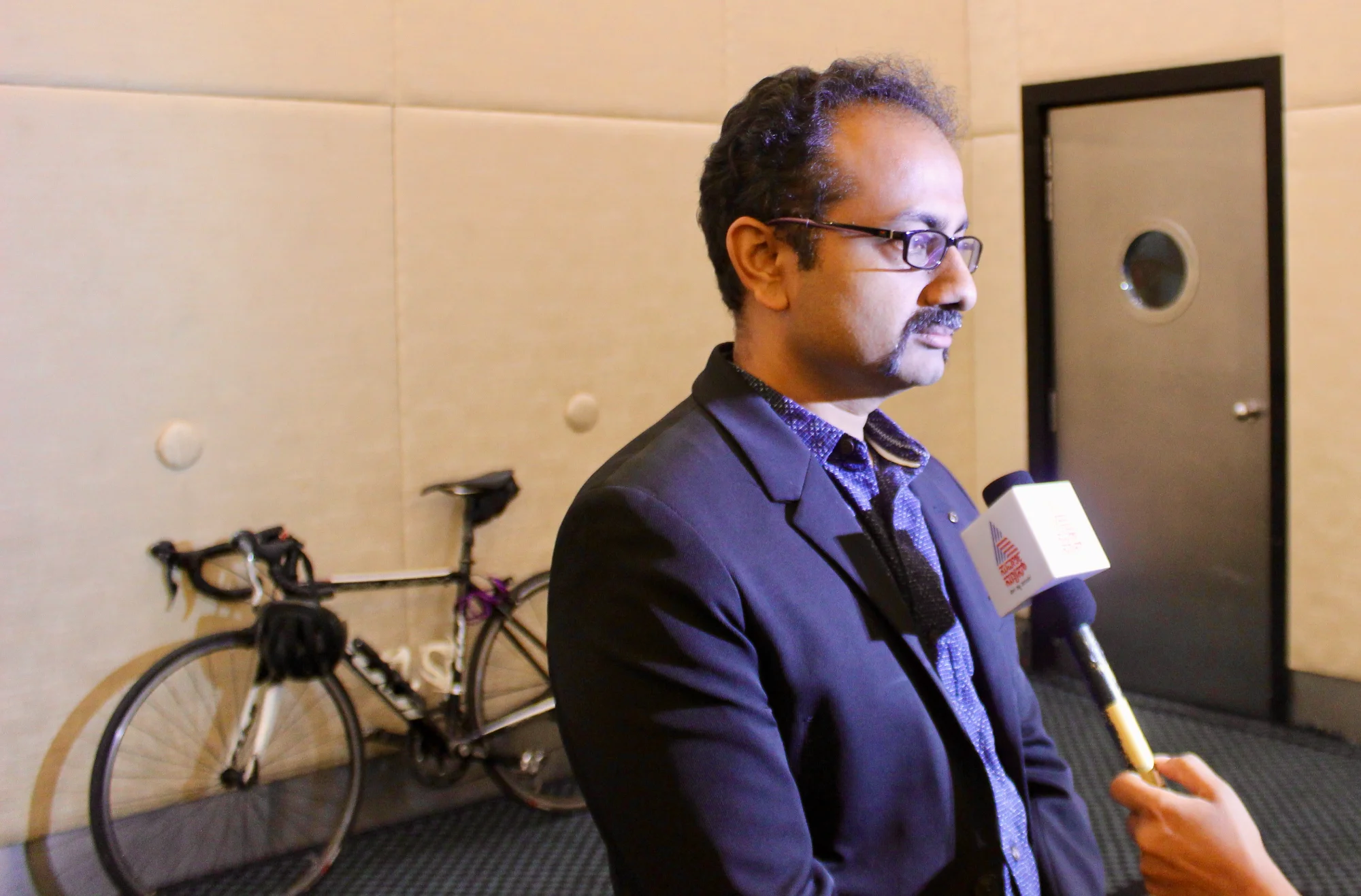 Sathya being interviewed